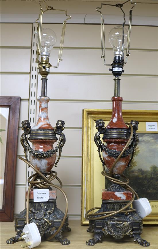 A pair of rouge marble gilt metal mounted table lamps